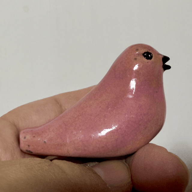 Small pink bird whistle