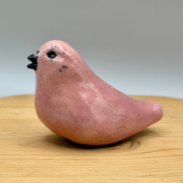 Small pink bird whistle