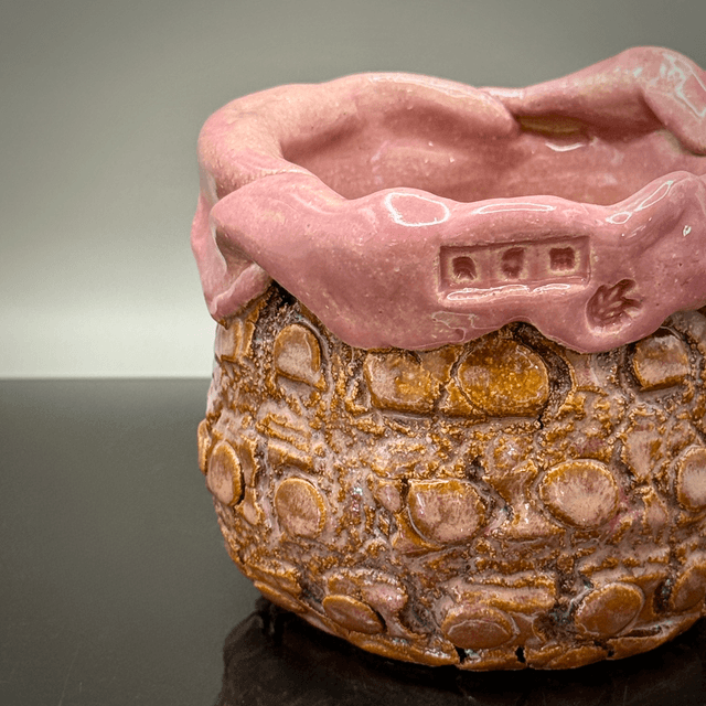 Cracks and silk pink crackpot